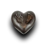 brons mini urn sterren kindje met voet en hand afdrukje