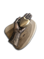 beeld van hand brons look met gouden urn. overlijden